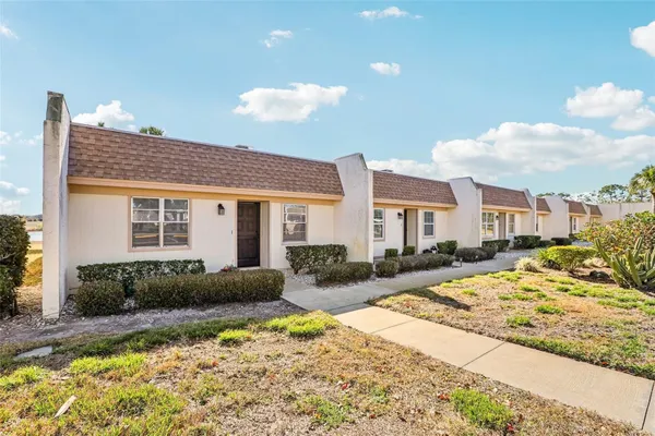 Property Slideshow image 2 of 36 | 11120 carriage hill dr 1, Port Richey, FL, 34668