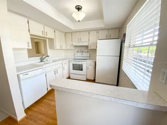 Property Slideshow image 3 of 38 | 1370 heather ridge blvd 204, Dunedin, FL, 34698