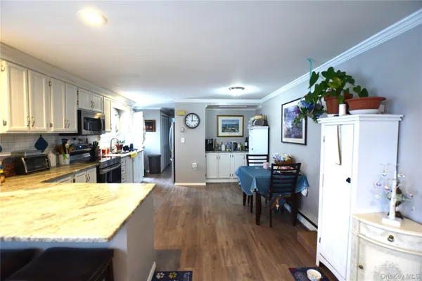 Property Slideshow image 3 of 31 | 77 village cir, Manorville, NY, 11949