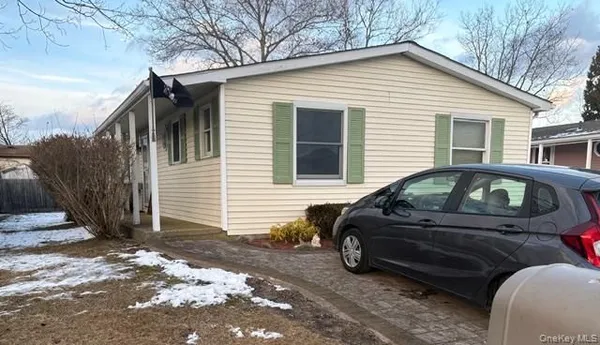 Property Slideshow image 2 of 2 | 42 village cir, Manorville, NY, 11949