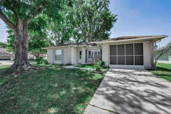 Property Slideshow image 3 of 82 | 9427 cape charles ave, New Port Richey, FL, 34655