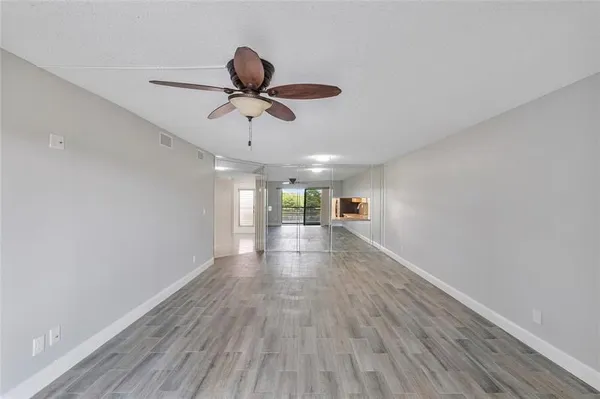 Property Slideshow image 2 of 15 | 4930 e sabal palm blvd apt 402, Tamarac, FL, 33319