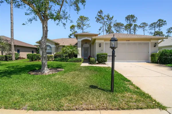Property Slideshow image 2 of 53 | 11147 brambleleaf way, Hudson, FL, 34667