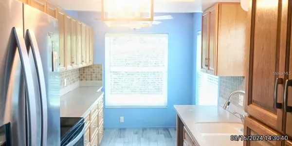 Property Slideshow image 3 of 13 | 11543 orleans ln # 11543, Port Richey, FL, 34668