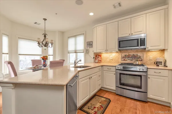 Property Slideshow image 2 of 22 | 568 pacing way # 568, Westbury, NY, 11590