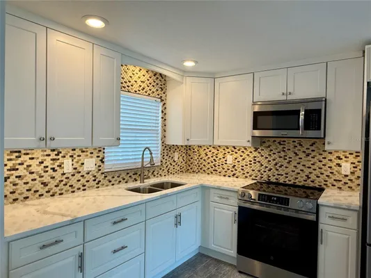 Property Slideshow image 2 of 35 | 4650 cove cir apt 108, St Petersburg, FL, 33708