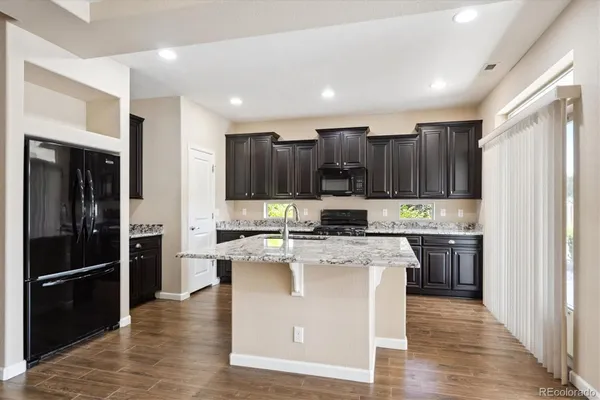 Property Slideshow image 3 of 27 | 5520 genoa st, Denver, CO, 80249