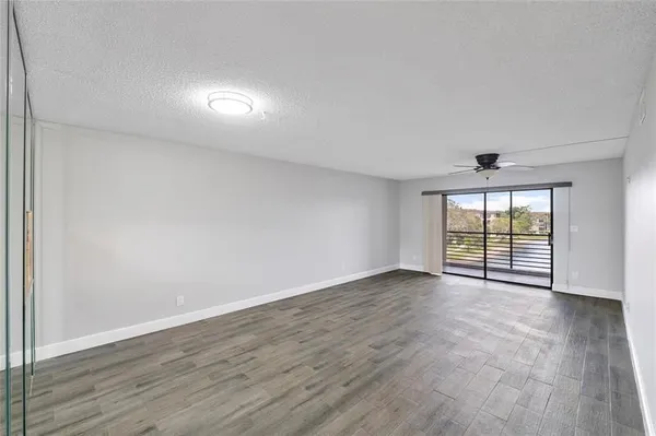 Property Slideshow image 3 of 15 | 4930 e sabal palm blvd apt 402, Tamarac, FL, 33319