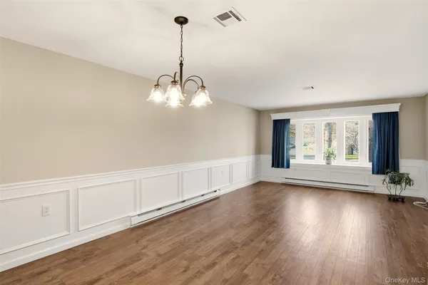 Property Slideshow image 3 of 34 | 360 woodbridge dr a, Ridge, NY, 11961