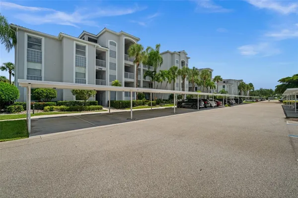 Property Slideshow image 2 of 61 | 10460 washingtonia palm way 1342, Fort Myers, FL, 33966
