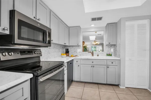 Property Slideshow image 2 of 43 | 860 maclaren dr b, Palm Harbor, FL, 34684