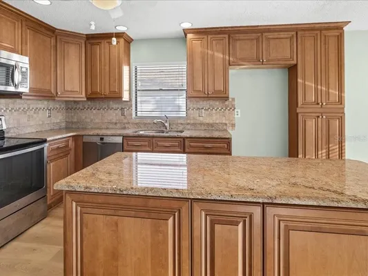 Property Slideshow image 3 of 51 | 411 cypress forest dr, Englewood, FL, 34223