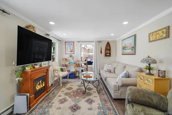 Property Slideshow image 3 of 27 | 126 village cir, Manorville, NY, 11949