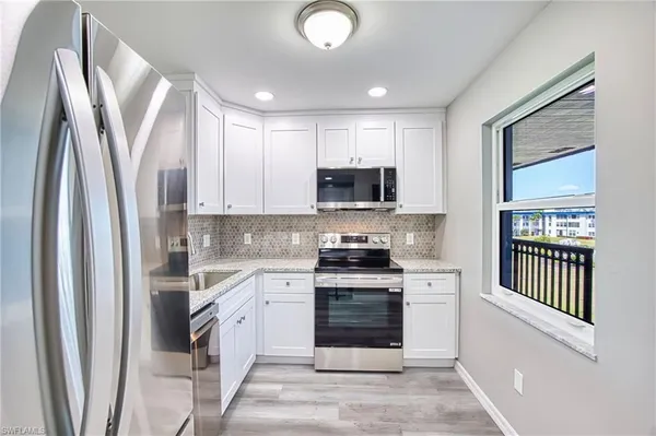 Property Slideshow image 2 of 50 | 1740 pine valley dr 313, Fort Myers, FL, 33907