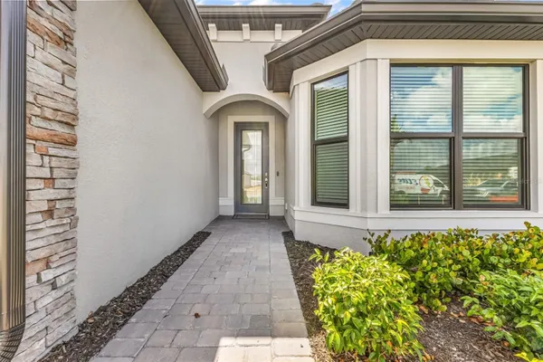 Property Slideshow image 2 of 75 | 4400 lakeside grove pl, North Port, FL, 34289