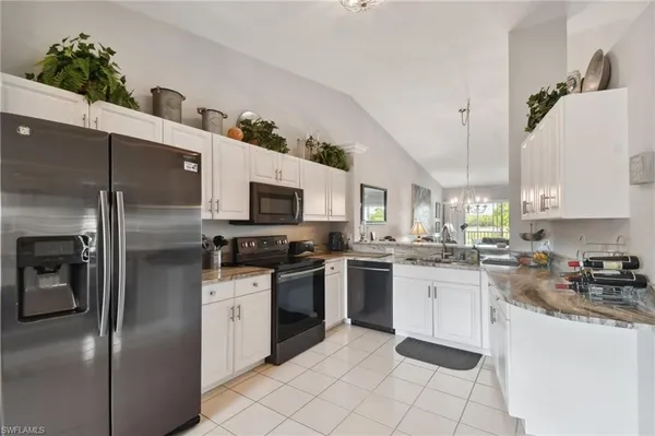 Property Slideshow image 2 of 39 | 9165 michael cir 1002, Naples, FL, 34113