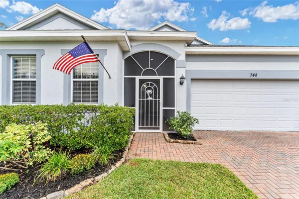 Property Slideshow image 3 of 83 | 748 summit greens blvd, Clermont, FL, 34711