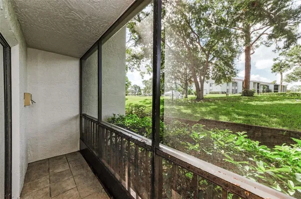 Property Slideshow image 3 of 27 | 2575 pine ridge way e1, Palm Harbor, FL, 34684