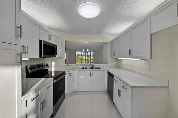 Property Slideshow image 3 of 39 | 7882 trent dr 310, Tamarac, FL, 33321