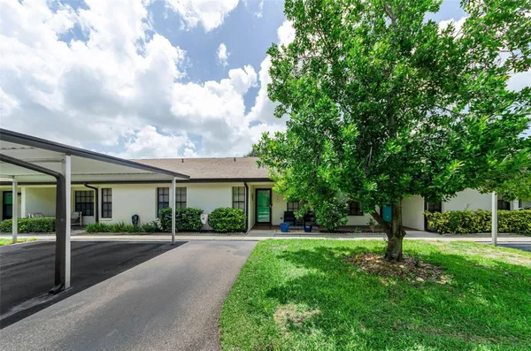 Property Slideshow image 3 of 67 | 1500 heather ridge blvd 106, Dunedin, FL, 34698