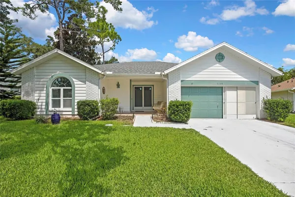 Property Slideshow image 2 of 62 | 7159 crown oaks dr, Spring Hill, FL, 34606