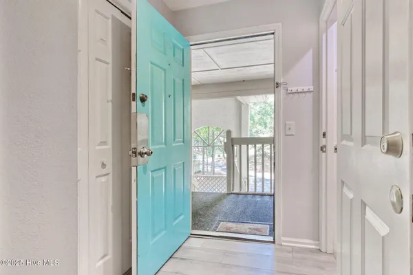 Property Slideshow image 3 of 35 | 223 clubhouse rd 5, Sunset Beach, NC, 28468