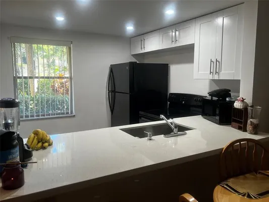 Property Slideshow image 2 of 21 | 9091 lime bay blvd 114, Tamarac, FL, 33321