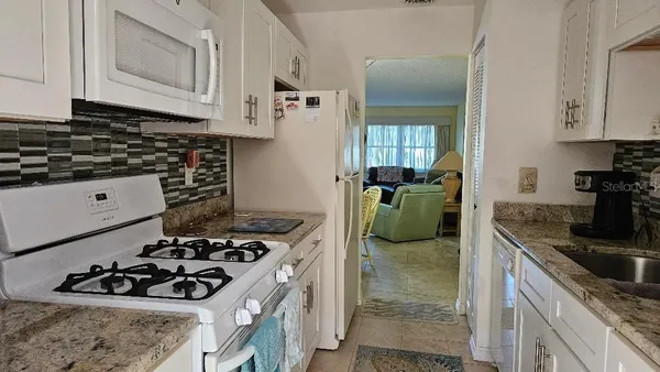 Property Slideshow image 3 of 32 | 5975 terrace park dr n unit 102, St Petersburg, FL, 33709