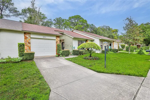 Property Slideshow image 3 of 45 | 6591 brambleleaf dr, Spring Hill, FL, 34606