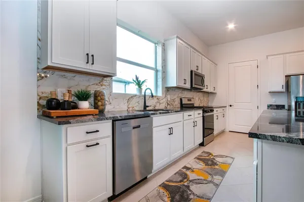 Property Slideshow image 3 of 76 | 9126 barrier coast trl, Parrish, FL, 34219