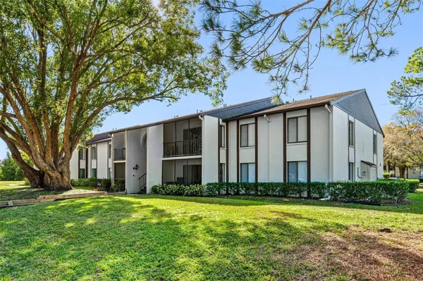 Property Slideshow image 3 of 32 | 2642 pine ridge way g2, Palm Harbor, FL, 34684