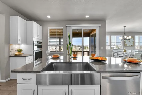 Property Slideshow image 3 of 9 | 6841 w asbury pl, Lakewood, CO, 80227