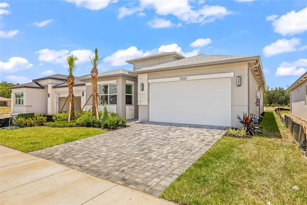 Property Slideshow image 2 of 47 | 32565 veneto pl, Wesley Chapel, FL, 33543
