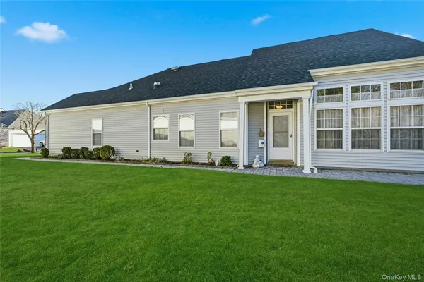 Property Slideshow image 2 of 30 | 10 sagaponack ct # 10, Ridge, NY, 11961