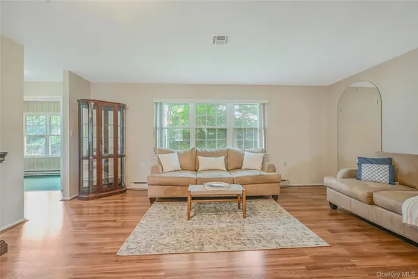 Property Slideshow image 2 of 24 | 310 woodbridge dr unit c, Ridge, NY, 11961