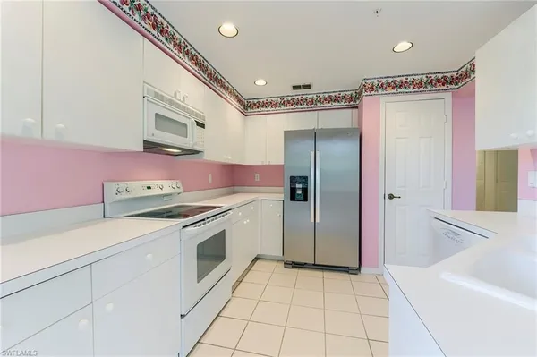 Property Slideshow image 3 of 35 | 25203 pelican creek cir 102, Bonita Springs, FL, 34134