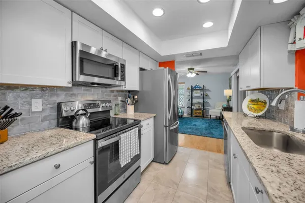 Property Slideshow image 2 of 100 | 2968 macalpin dr, Palm Harbor, FL, 34684