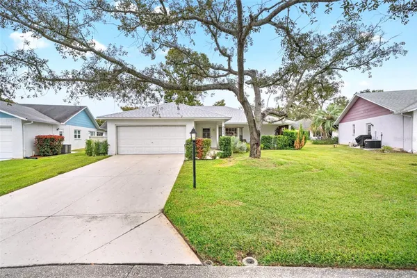 Property Slideshow image 2 of 67 | 6404 lost tree ln, Spring Hill, FL, 34606