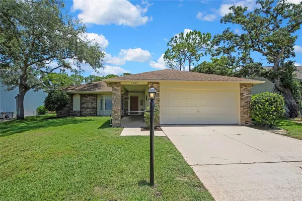 Property Slideshow image 3 of 46 | 7103 crown oaks dr, Spring Hill, FL, 34606