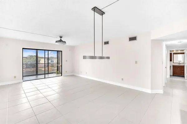 Property Slideshow image 2 of 26 | 4930 e sabal palm blvd 414, Tamarac, FL, 33319