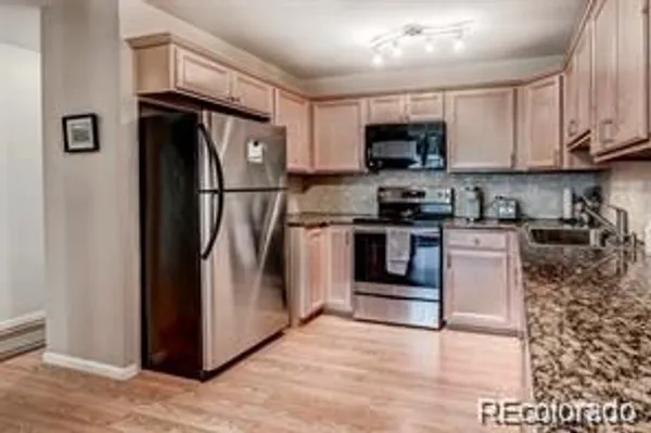Property Slideshow image 2 of 12 | 705 s clinton st apt 9b, Denver, CO, 80247