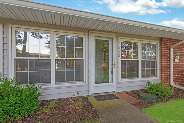 Property Slideshow image 2 of 15 | 164 falmouth ct e, Ridge, NY, 11961