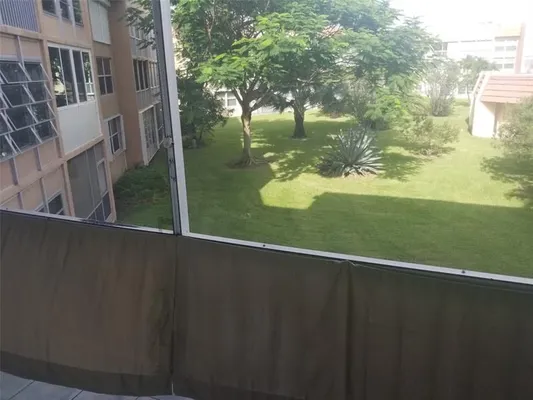 Property Slideshow image 2 of 8 | 6650 royal palm blvd c 205, Margate, FL, 33063