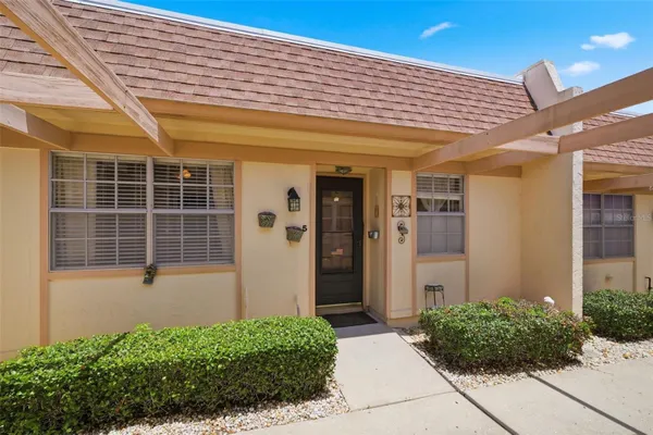 Property Slideshow image 3 of 44 | 11210 carriage hill dr 5, Port Richey, FL, 34668