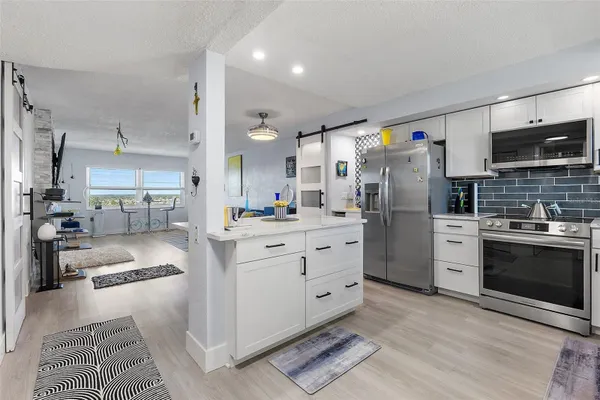Property Slideshow image 3 of 29 | 4725 cove cir 704, St Petersburg, FL, 33708