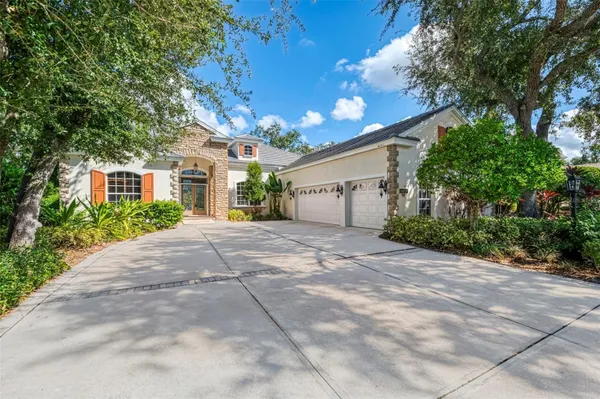 Property Slideshow image 2 of 79 | 4889 carrington cir, Sarasota, FL, 34243