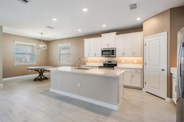 Property Slideshow image 3 of 62 | 10515 gable dig loop, San Antonio, FL, 33576