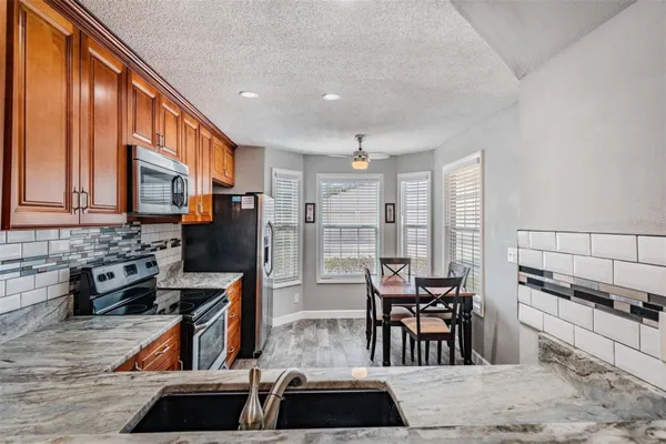 Property Slideshow image 3 of 33 | 11308 versailles ln c, Port Richey, FL, 34668