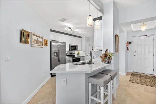 Property Slideshow image 3 of 25 | 424 luna bella ln apt 415, New Smyrna Beach, FL, 32168