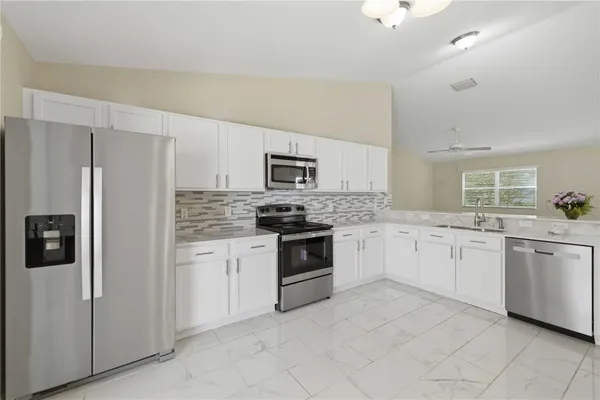 Property Slideshow image 3 of 24 | 1972 ashwood run, The Villages, FL, 32162